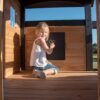 Backyard Discovery Canyon Creek Cedar Wood Swing Set with Wave Slide, Clubhouse, Play Kitchen, Picnic Area, Belt Swings, Web Swing, Rock Wall,...
